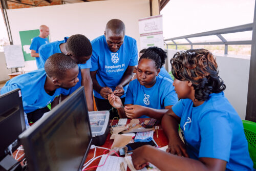Kenyan educators work on a physical computing project.