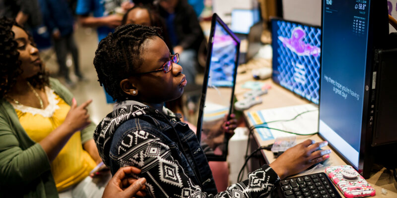 At Coolest Projects, a young person explores a coding project.