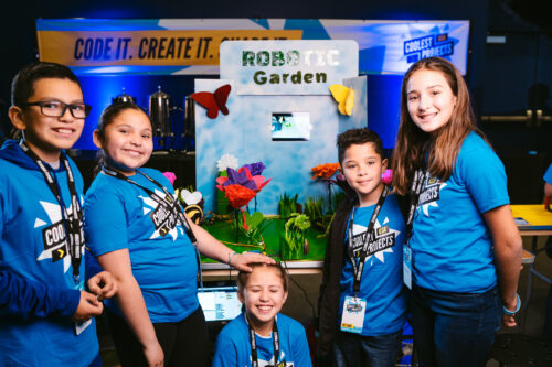 Five young coders show off their robotic garden tech project for Coolest Projects.