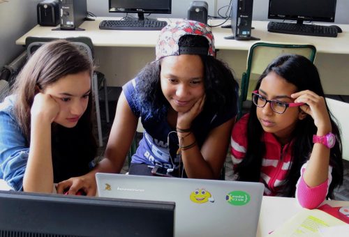 Three teenage girls at a laptop