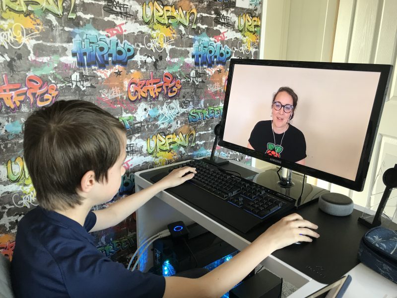 A young person having fun with digital making at home