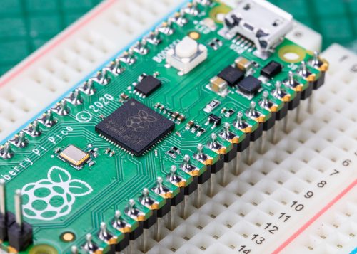 A soldered Raspberry Pi Pico on a breadboard.